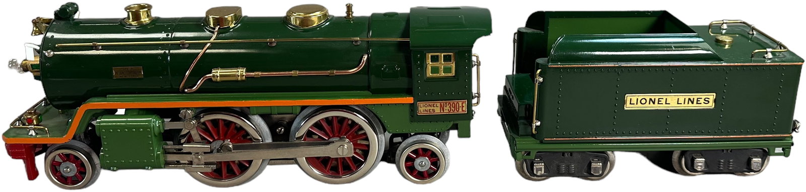 GREEN LIONEL 390E LOCOMOTIVE: 328. GREEN LIONEL 390E LOCOMOTIVE | Standard gauge, electric. Ex: Cantey Johnson Collection. | 13" l. | Restored. | $300 - $600