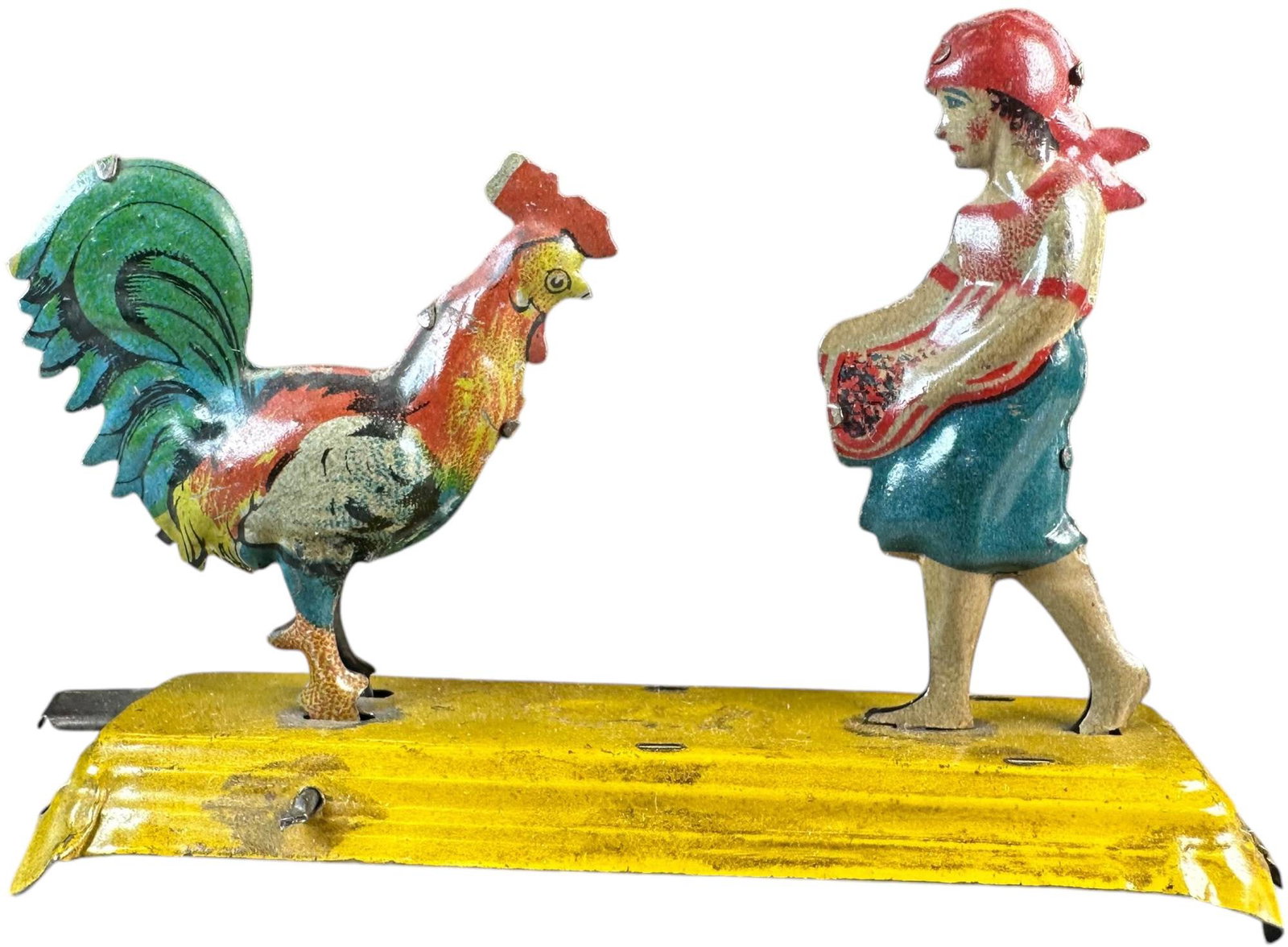 MEIER GIRL FEEDING CHICKEN PENNY TOY: 139. MEIER GIRL FEEDING CHICKEN PENNY TOY | Germany. | 3.5" l. | (Excellent Condition) | $200 - $400