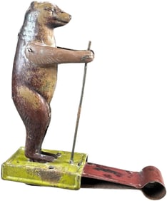 JUMPING BEAR PENNY TOY