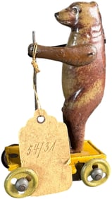 BEAR WITH STICK PENNY TOY