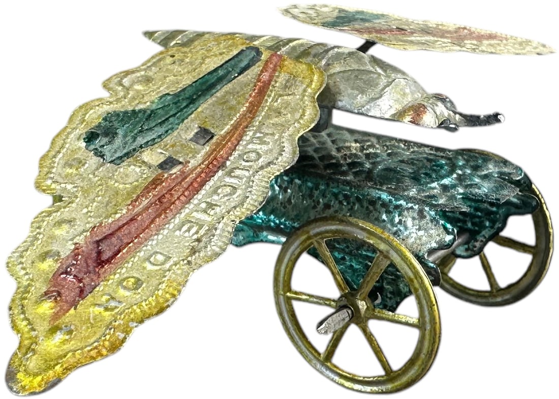 THE GOLDEN FLY FLAPPING PENNY TOY (1 of 6)