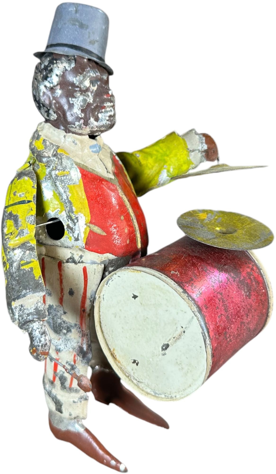 M&K ONE MAN DRUM BAND: 288. M&K ONE MAN DRUM BAND | Germany, hand painted, wind-up motor driven. | 9" h. | Original paint with expected wear, (Very Good Condition) | $700 - $1,000