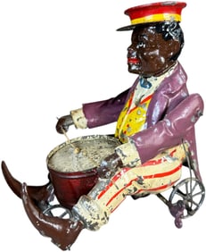 M&K SEATED BLACK DRUMMER