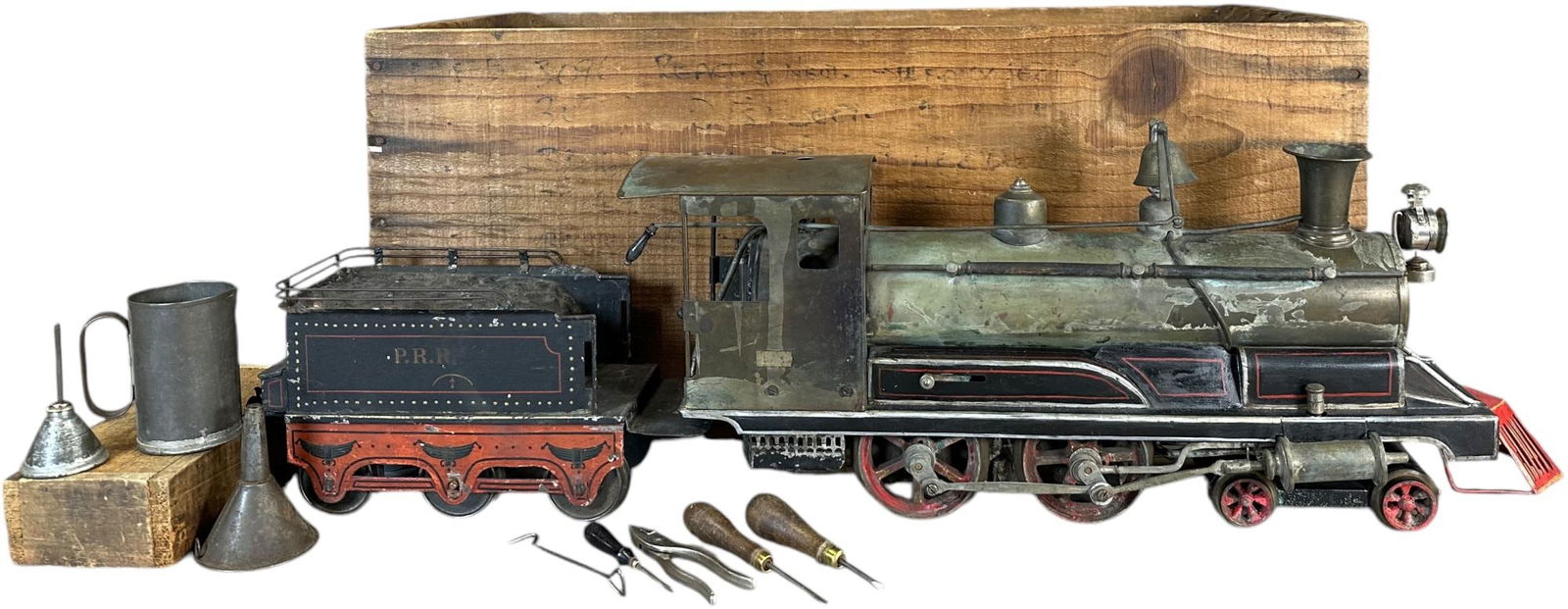 RARE MARKLIN GAUGE III E-3 LOCOMOTIVE: 395. RARE MARKLIN GAUGE III E-3 LOCOMOTIVE | Marklin's gauge 3 (75mm gauge, same as Bing's gauge 4), live steam, includes what appears to be original wooden shipping box, very few of these American ma
