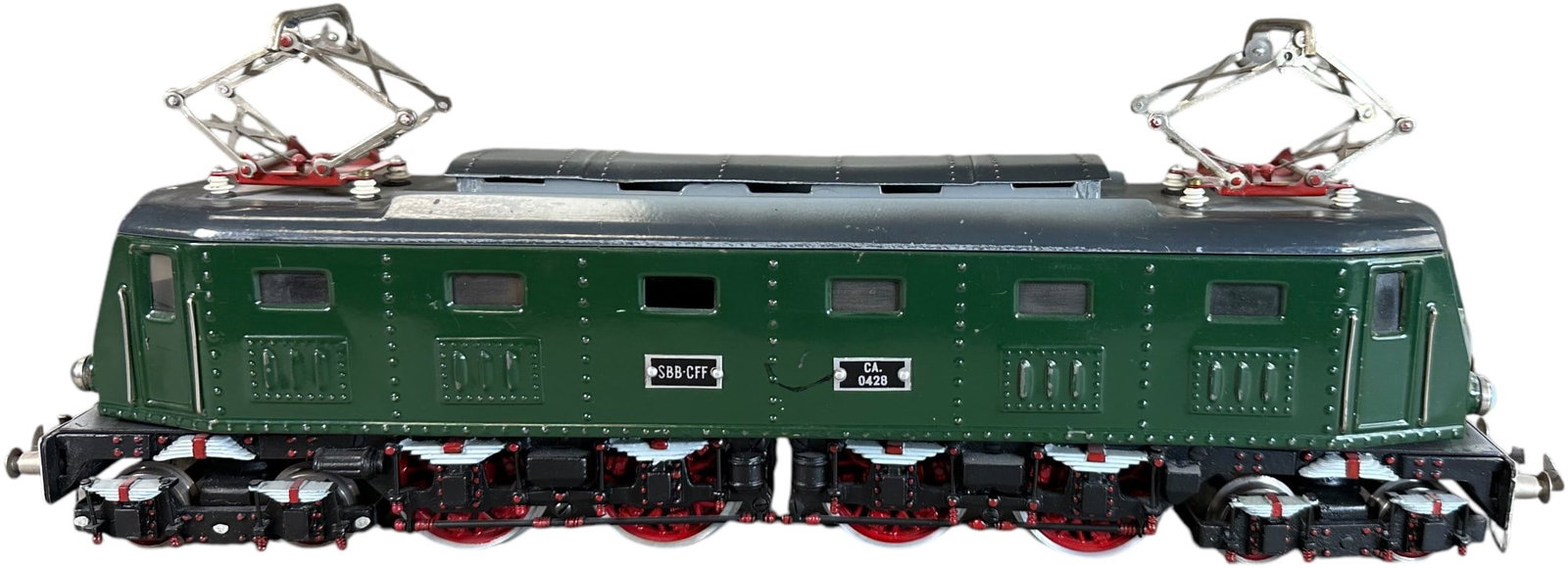 ELETTREN SWISS Y28 ELOK: 474. ELETTREN SWISS Y28 ELOK | 0 gauge, electric. Book example from the Count Coluzzi Collection. | 15.5" l. | One loose wire on pantograph, (Near Mint Condition) | $800 - $1,400