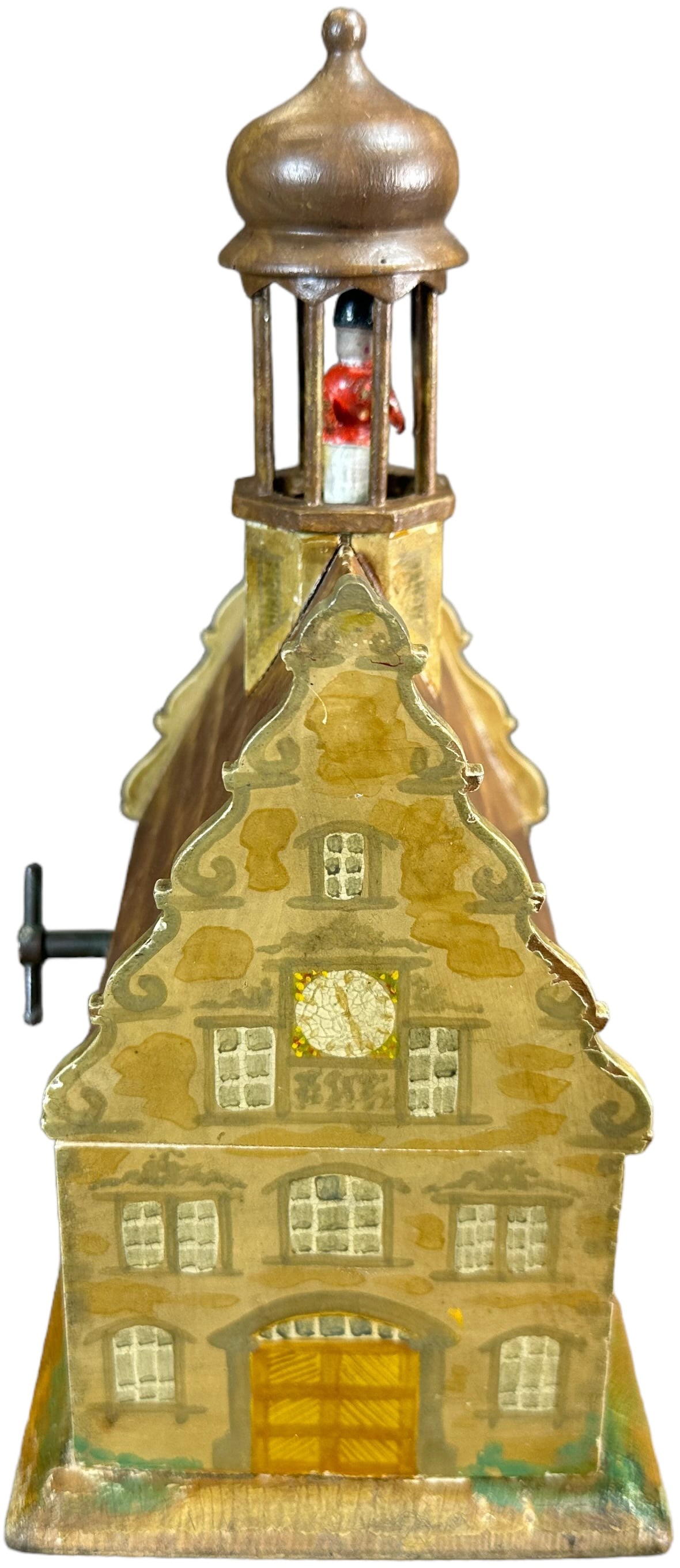 MUSICAL CHURCH WOODEN MECHANICAL BANK: 1245. MUSICAL CHURCH WOODEN MECHANICAL BANK | Made in Germany, circa 1910, scarce and desirable made of wood and hand painted, wind-up music box plays a tune when coin is inserted. | 8.5" h. | Cupola