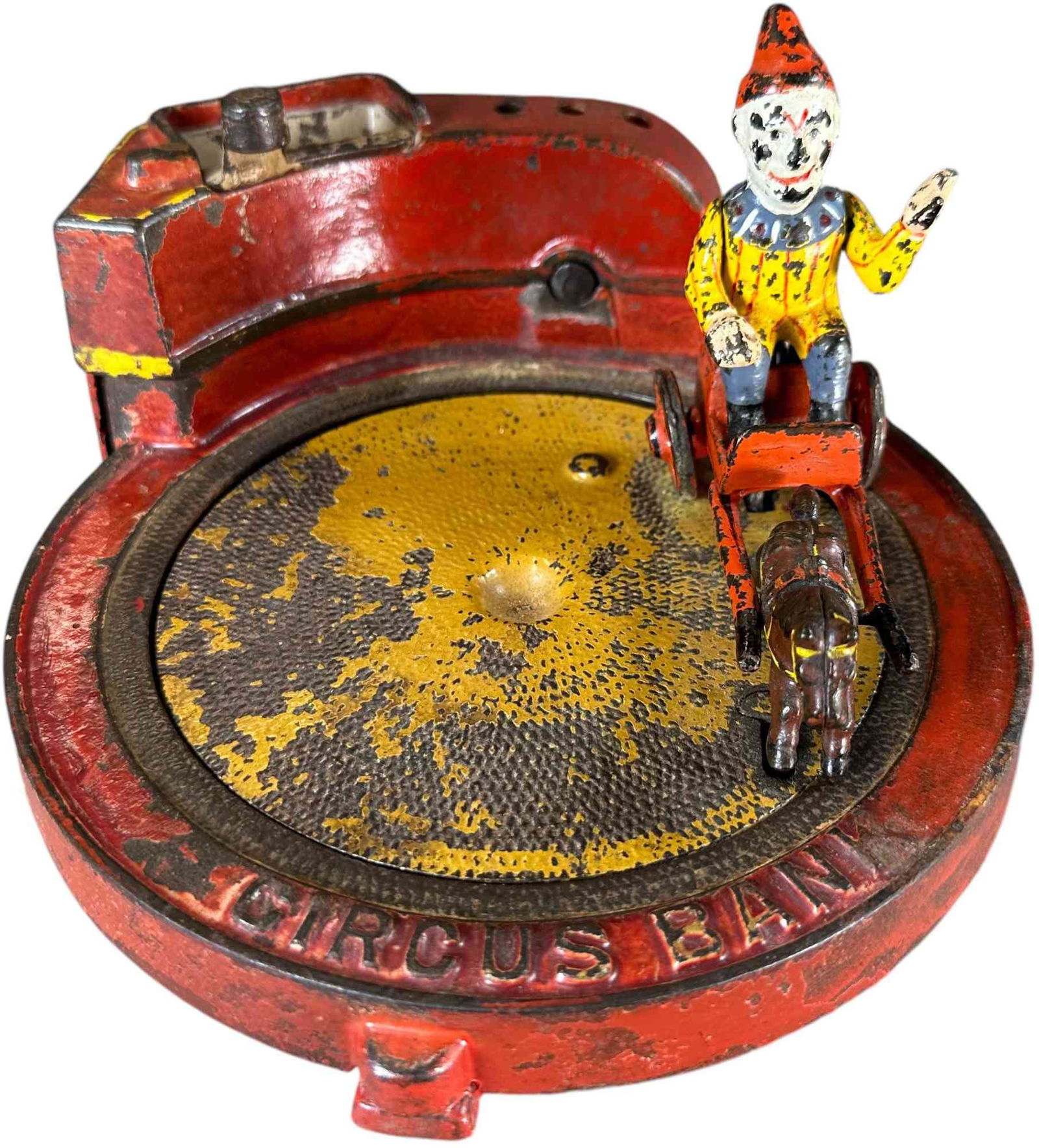 CIRCUS BANK MECHANICAL BANK: 1279. CIRCUS BANK MECHANICAL BANK | Shepard Hardware Co., scarce and very popular circus theme, replacement removable handle at rear operates the bank causing the clown cart to revolve in circle to ma