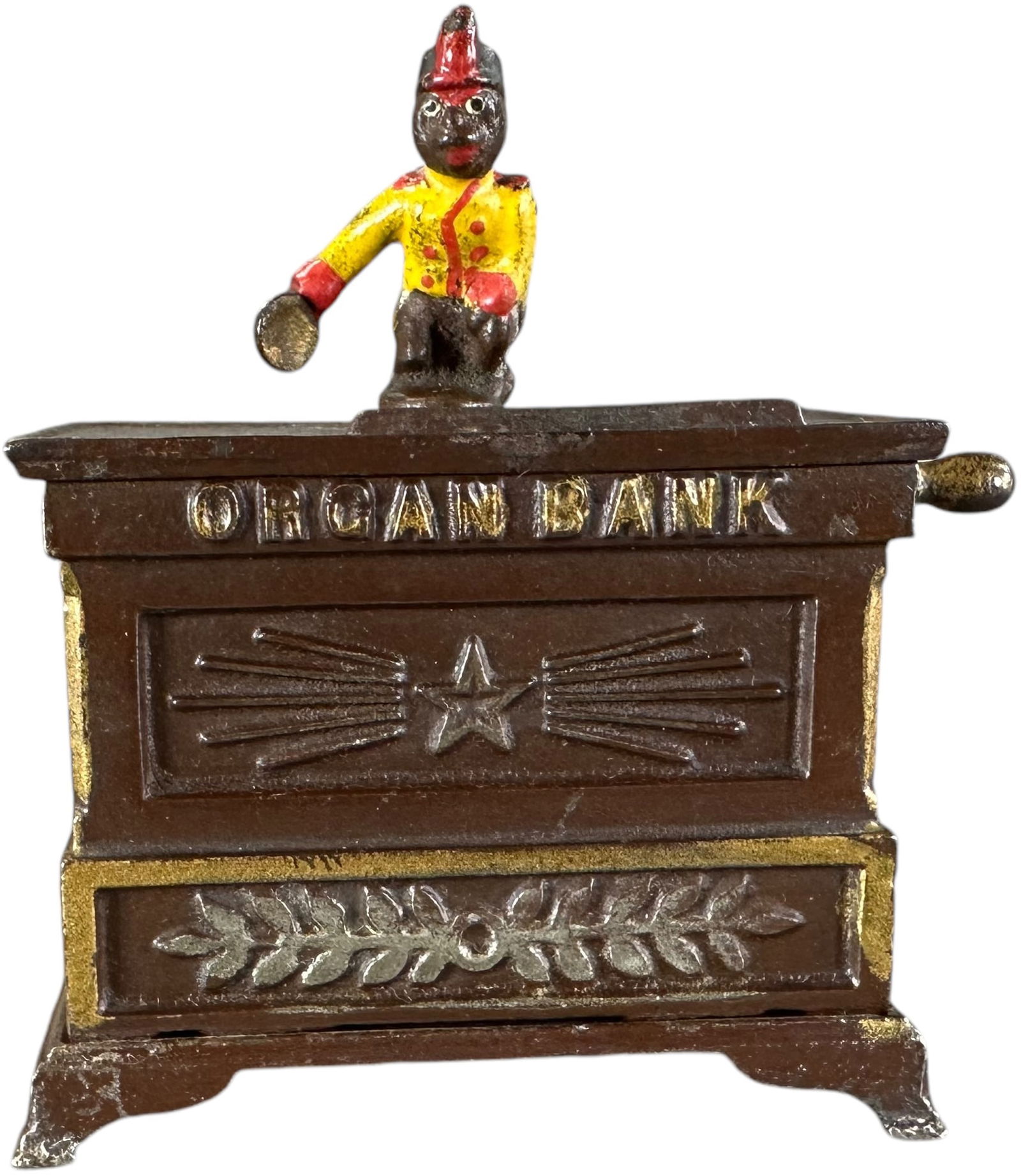 ORGAN BANK MINIATURE MECHANICAL BANK: 1296. ORGAN BANK MINIATURE MECHANICAL BANK | Kyser & Rex Co., smallest of three sizes produced. | 4" h. | Has original gold striping on edge of top plate, crack at top plate otherwise (Excellent to Pr