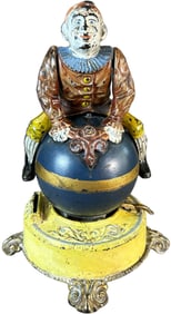 CLOWN ON GLOBE MECHANICAL BANK