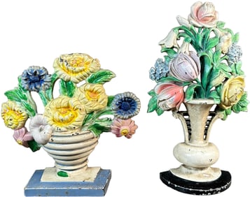 TWO HUBLEY FLORAL DOORSTOPS