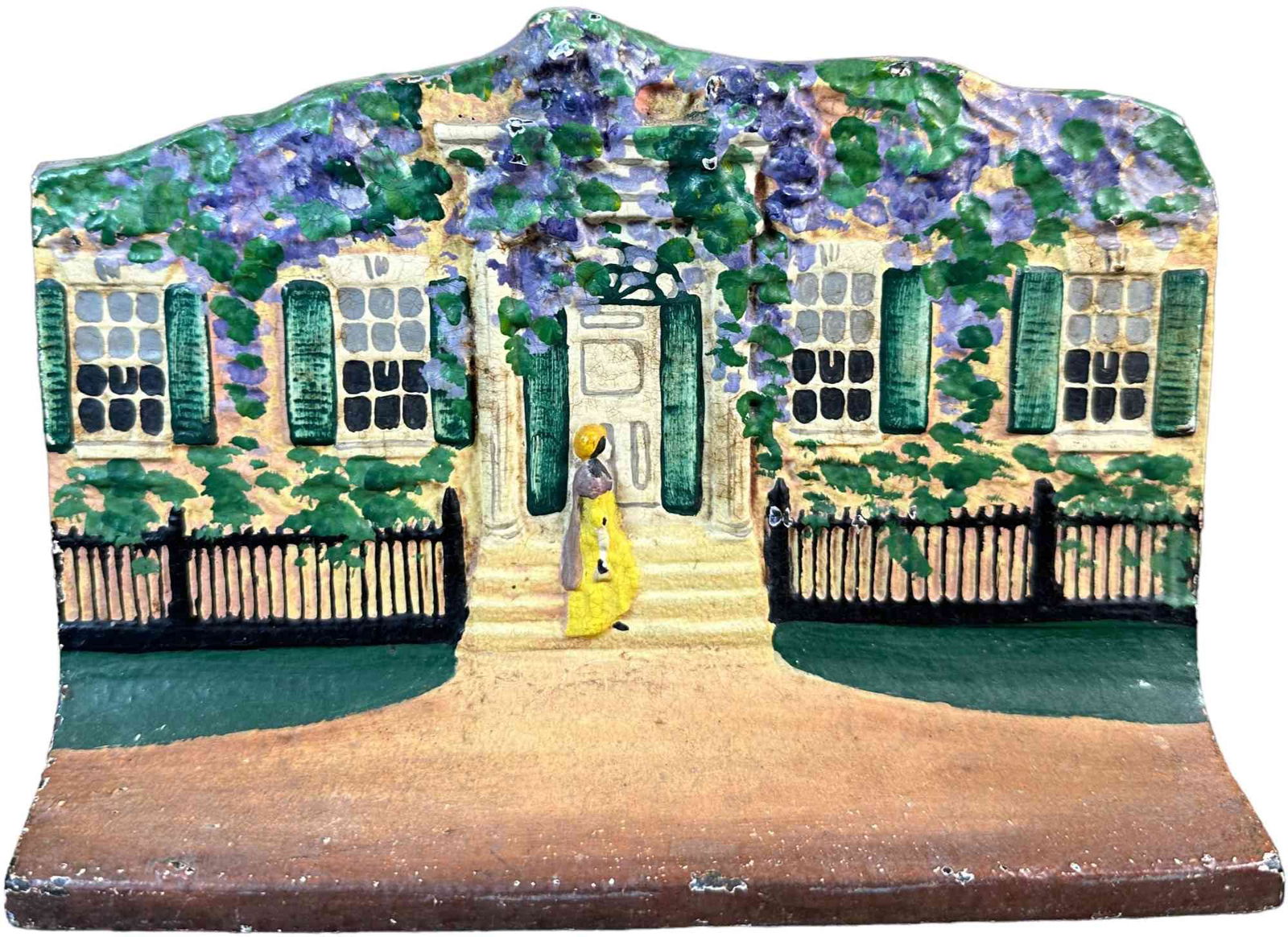 COTTAGE W/ WOMAN ON STEPS DOORSTOP (1 of 3)