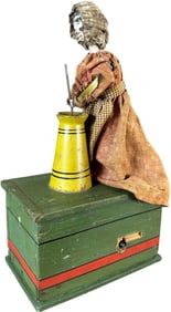 IVES WOMAN BUTTER CHURNER