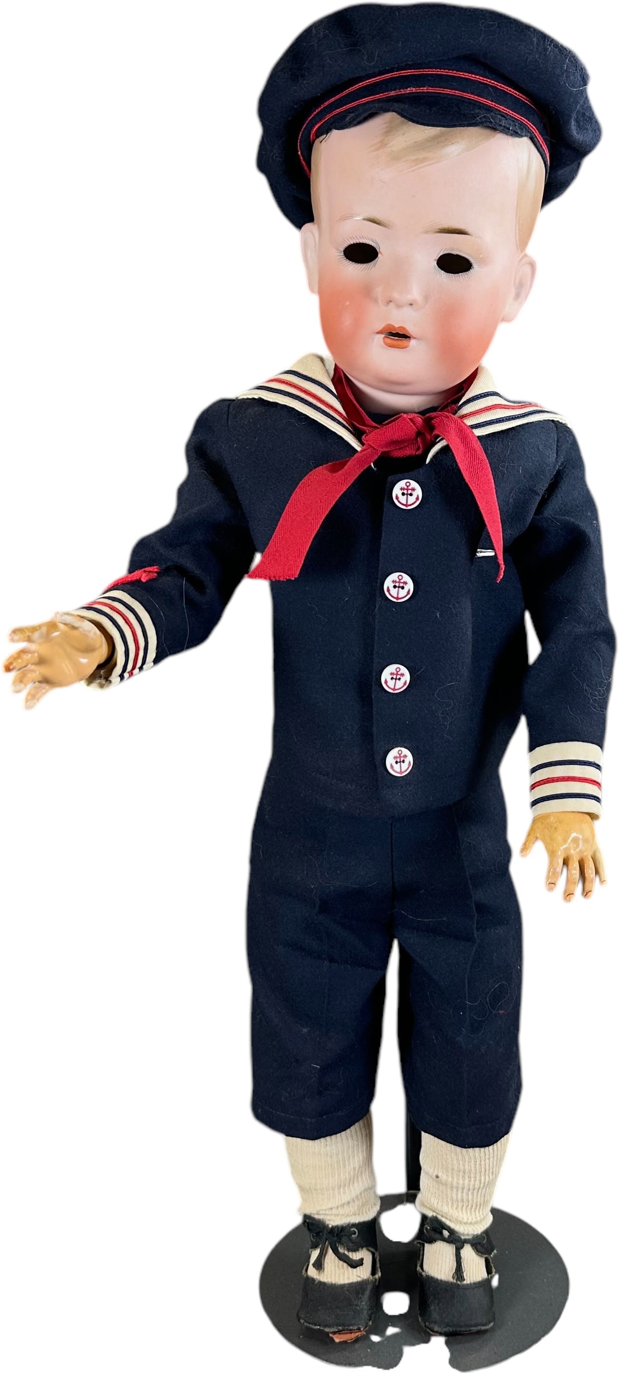 BRUNO & SCHMIDT TOMMY TUCKER: 57. BRUNO & SCHMIDT TOMMY TUCKER | B.S.W in heart, solid domed head in sailor suit on painted composition jointed body. | 24" h. | Eyes need reset; some repair to fingers, (Very Good Condition) | $100