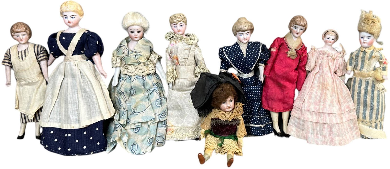 NINE DOLLHOUSE SIZE LADY DOLLS: 81. NINE DOLLHOUSE SIZE LADY DOLLS | 6" h. | (Excellent Condition) | $400 - $800