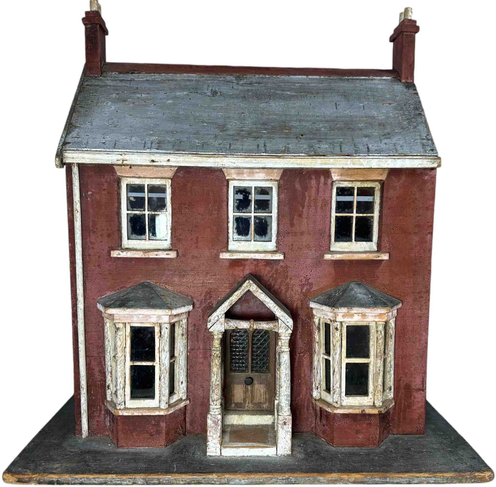 SMALL ENGLISH DOLL HOUSE: 175. SMALL ENGLISH DOLL HOUSE | With faux painted brick exterior with wood gutter, twin bay windows and front door with nicely detailed porch. circa early 20th century. The room interior is accessed v
