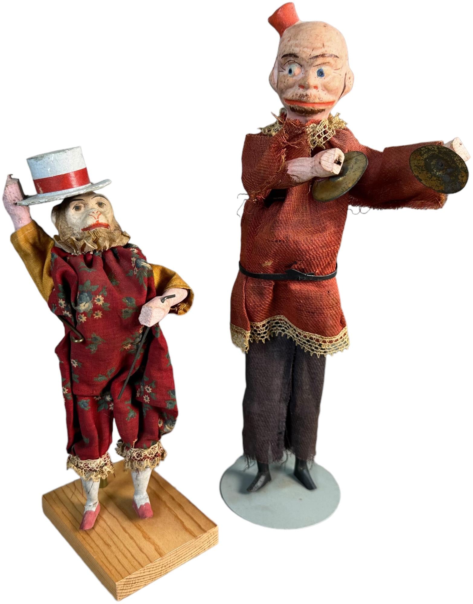 EARLY GERMAN SQUEEZE BOX TOY FIGURES: 271. EARLY GERMAN SQUEEZE BOX TOY FIGURES | 10.5" h. | Some distress to cymbal player's clothing, overall (Very Good to Excellent Condition) | $200 - $400