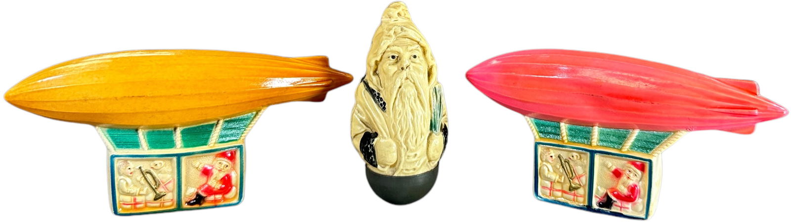 TWO CELLULOID ZEPPELINS & SANTA ROLY POLY (1 of 2)