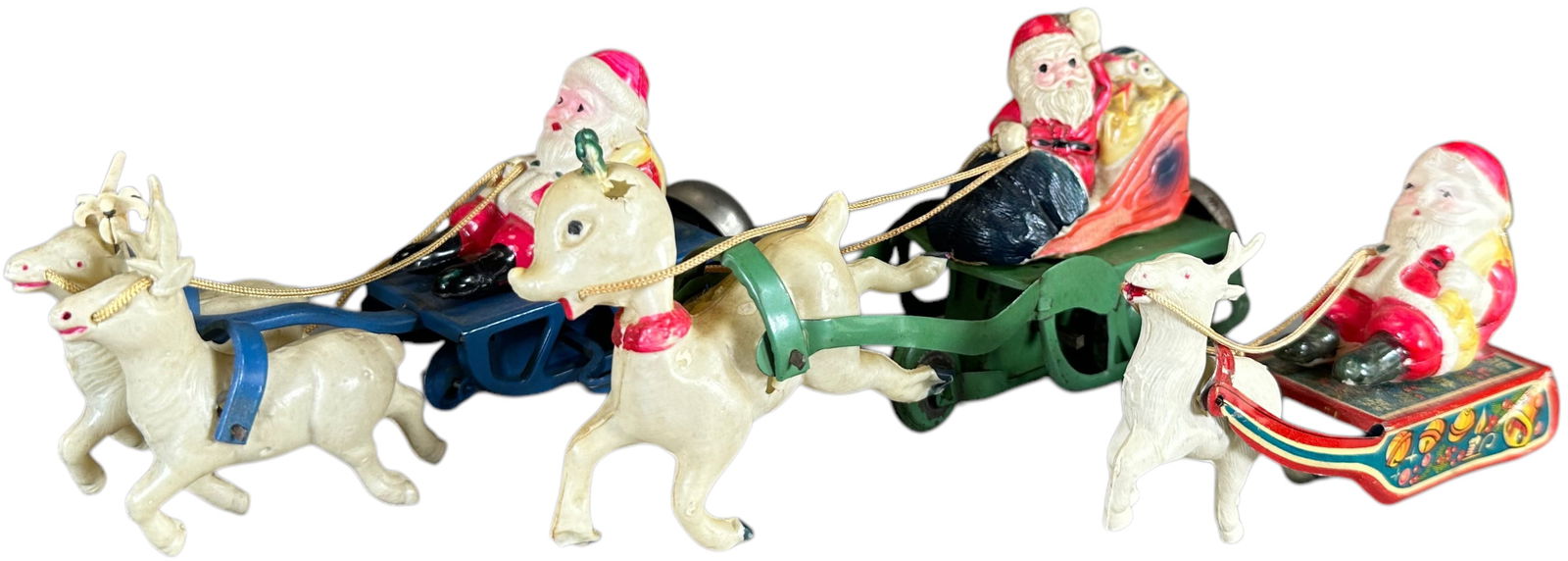 THREE SANTA AND SLEIGHS WIND-UP TOYS (1 of 6)
