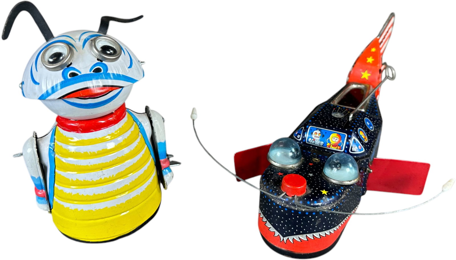 YOSHIYA SPACE WHALE SHIP & MARX MOON CREATURE: 12. YOSHIYA SPACE WHALE SHIP & MARX MOON CREATURE | Wind-up mechanism allows the whale to move forward as his jaw opens and closes, sparks are visible through window on his back. | 9" l. | Overall (Ve