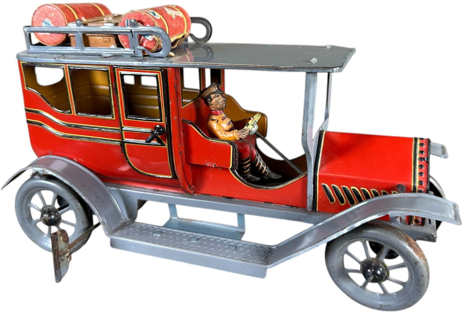 LARGE HANS EBERL LIMOUSINE: 27. LARGE HANS EBERL LIMOUSINE | Germany, wind-up driven. When wound, tires spin, but delays when on tabletop, gears not synced. | 10.5" l. | Top of bonnet & the front areas of fenders are repainted,