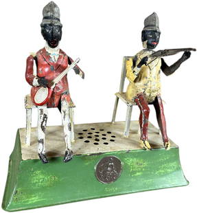 GUNTHERMANN SEATED MINSTREL MUSICIANS: 64. GUNTHERMANN SEATED MINSTREL MUSICIANS | Germany, wind-up driven. When wound the figures each play their instruments while violinist shakes head and guitar man sticks out tongue, music emits from b