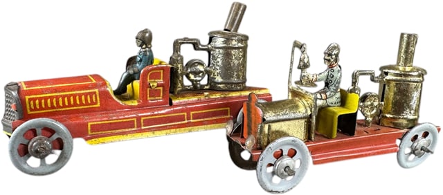 TWO FIRE PUMPER PENNY TOYS