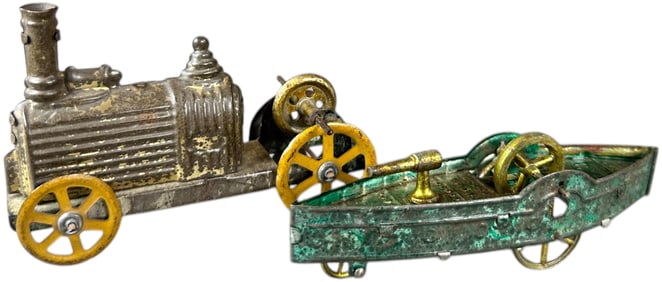 TWO FRENCH FLYWHEEL PENNY TOYS