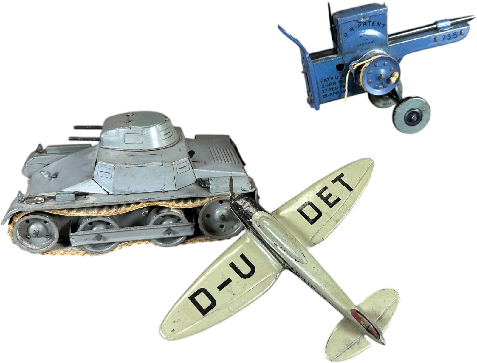 LEHMANN TANK W/ AIRPLANE & MACHINE GUN: 295. LEHMANN TANK W/ AIRPLANE & MACHINE GUN | 5" l. | Lid of tank as well as shovel & two searchlight are touched up (Very Good Condition), machine gun & plane are both original (Excellent Condition)