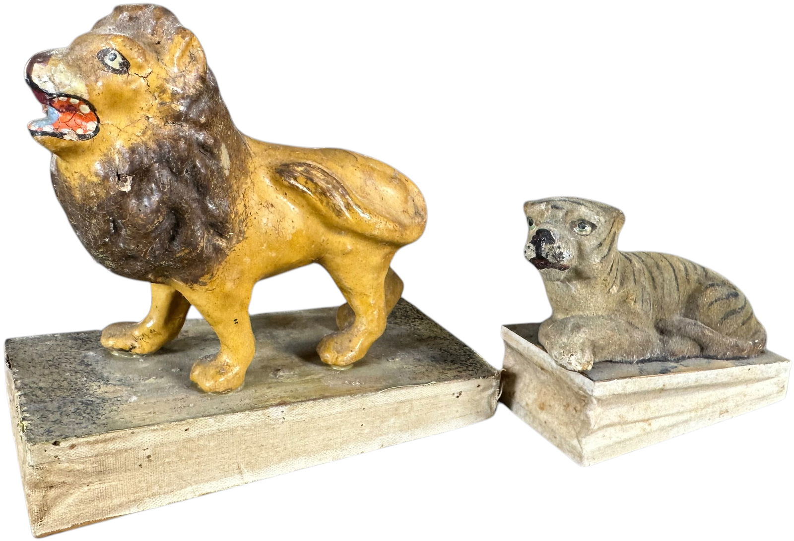 LION AND TIGER SQUEAK TOY: 57. LION AND TIGER SQUEAK TOY | Germany, unusual subjects, compress bottom bellows for squeak. The Curtis & Linda Smith Collection. 4.5" l. | Some touchup to lion's nose area and cracks in bellows, (V