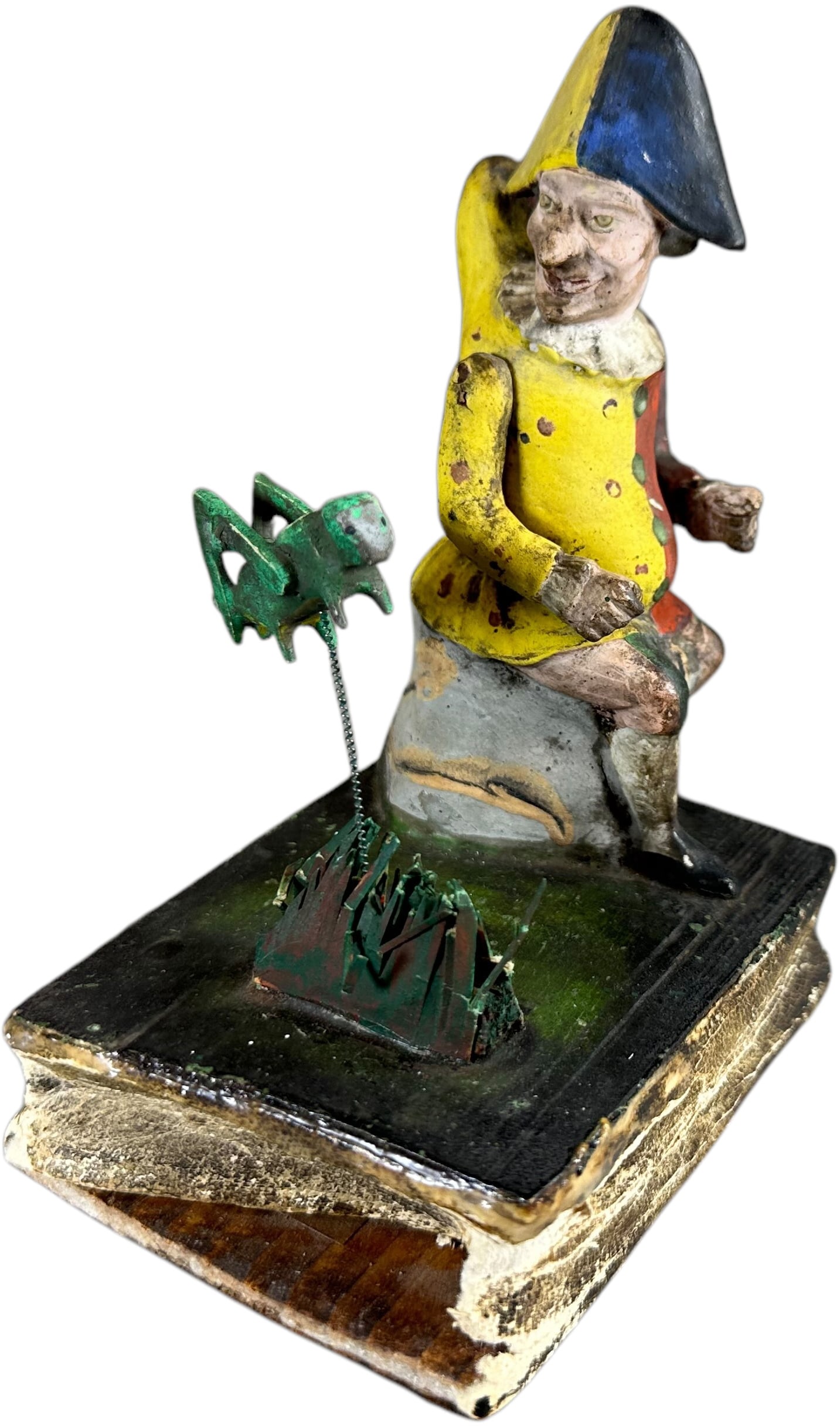 PUNCH W/ JUMPING CRICKET SQUEAK TOY: 92. PUNCH W/ JUMPING CRICKET SQUEAK TOY | Germany, compress bottom bellows for squeak, the cricket on wire jumps back and forth. The Curtis & Linda Smith Collection. 5.5" h. | All original though ther