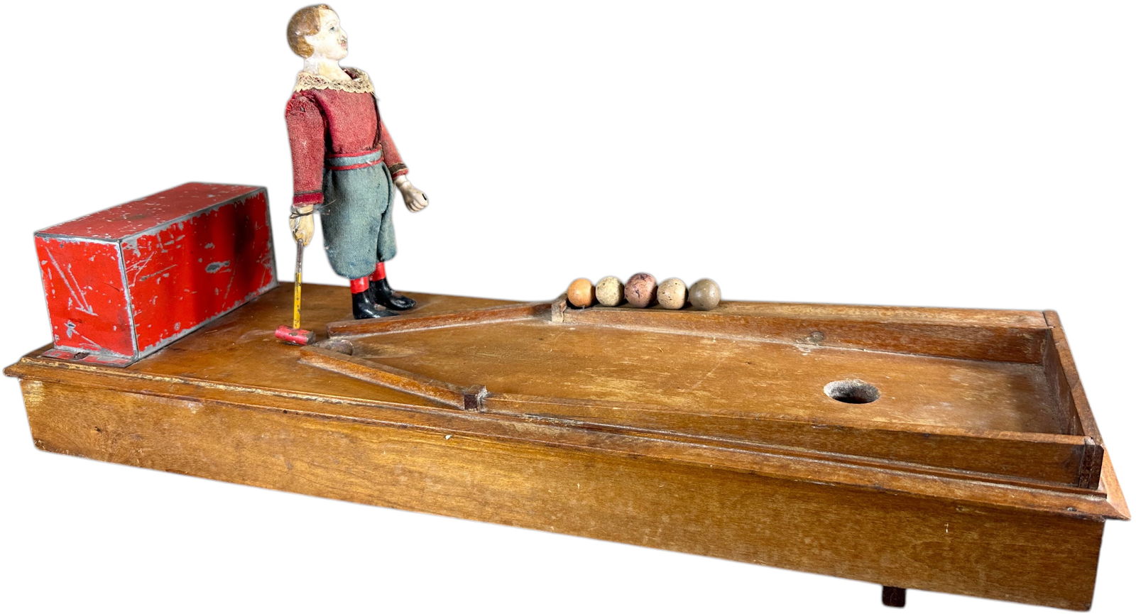 AUTOMATIC TOY WORKS BALL & MALLET TOY: 135. AUTOMATIC TOY WORKS BALL & MALLET TOY | This is an early and very rare clockwork toy to which only a few have ever turned up, this example features a hand painted tin motor cover/box behind playe