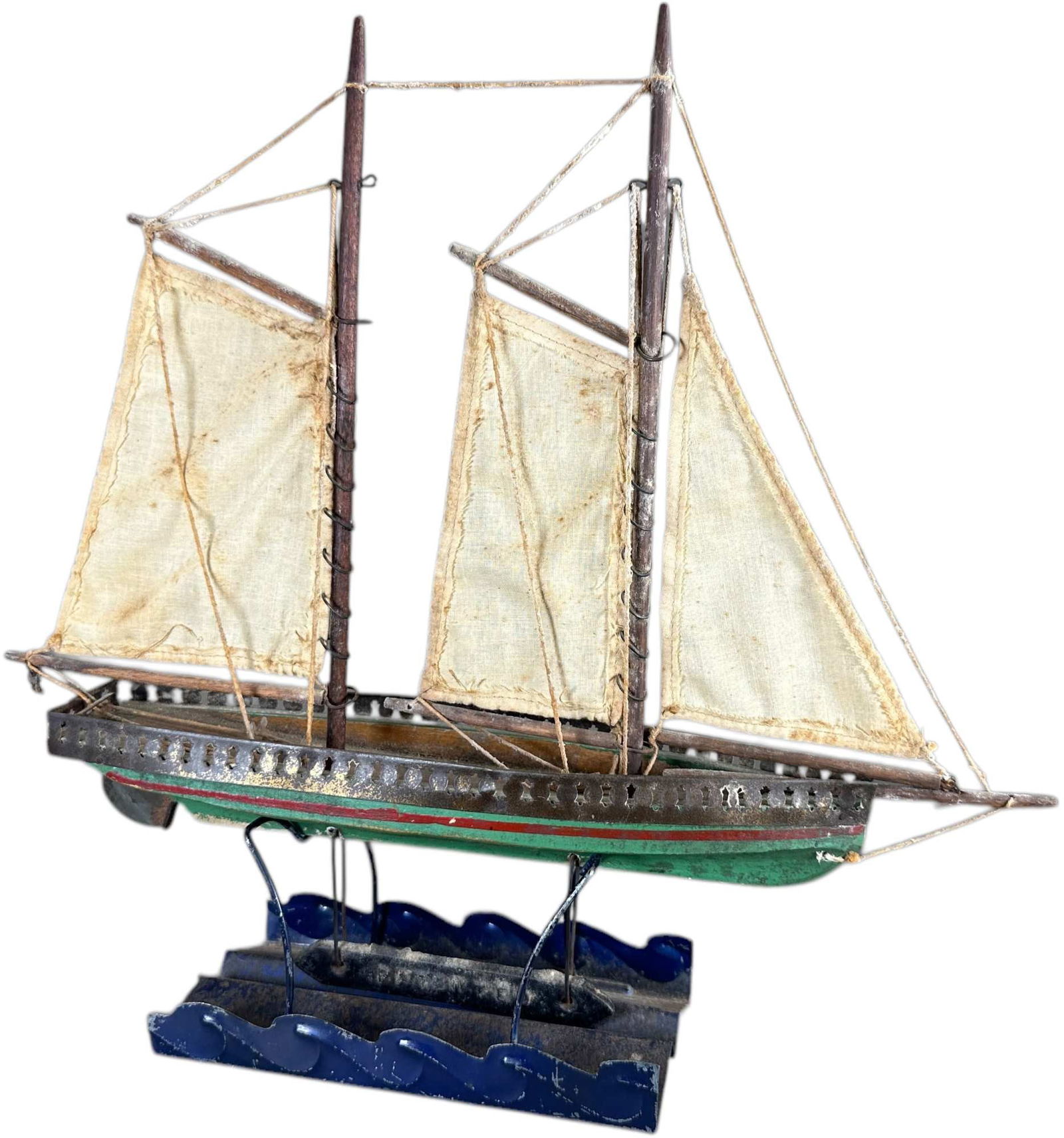 FLOATING SAILBOAT W/ COUNTERWEIGHT: 148. FLOATING SAILBOAT W/ COUNTERWEIGHT | This is a very unusual toy boat, wooden masts and clothe sails fly over a wooden hull with tin railings, a long counterweight hangs below ship as a keel, a se
