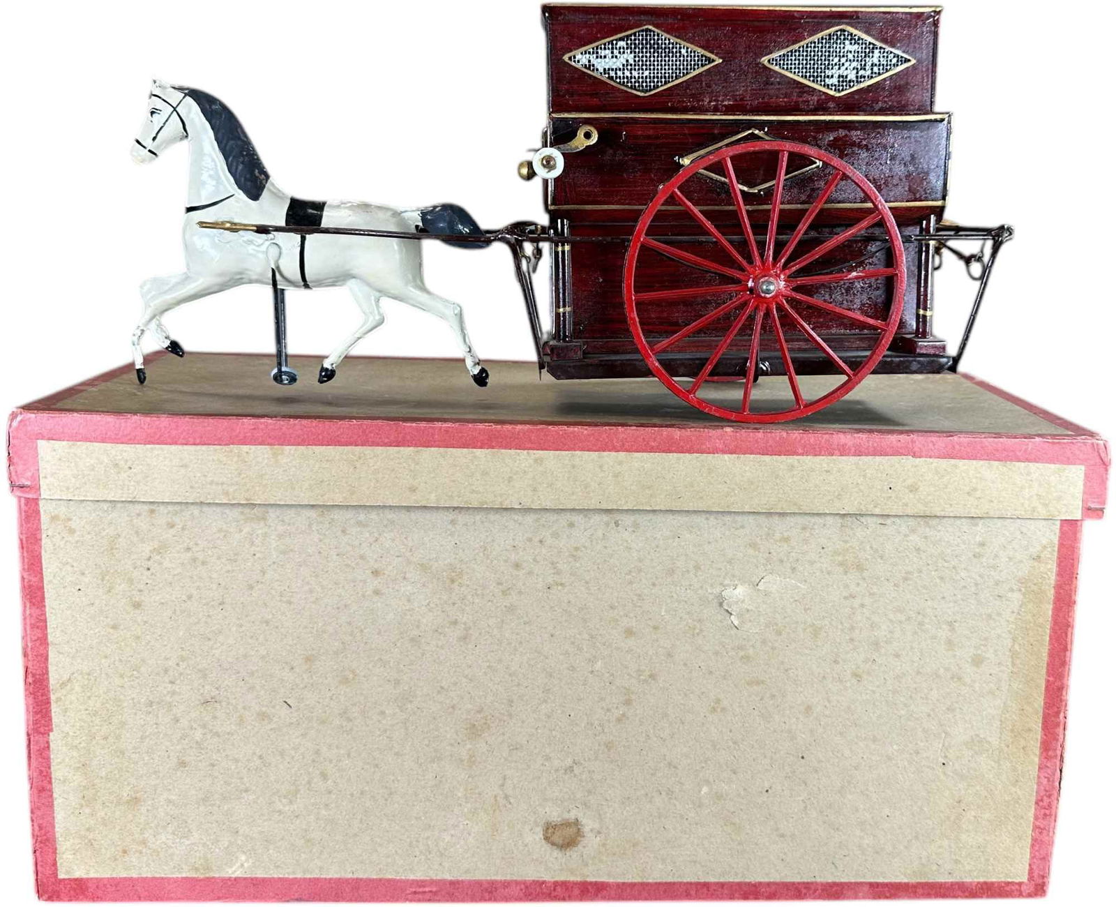 BOXED HISPANIA HORSE DRAWN MUSICAL WAGON: 247. BOXED HISPANIA HORSE DRAWN MUSICAL WAGON | Rare hand painted Spanish toy is in unplayed with condition, hand cranked organ box emits a beautiful and intricate chime tune when wound, without a dou