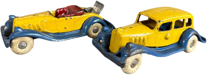 TWO AC WILLIAMS TAKE APART AUTOMOBILES