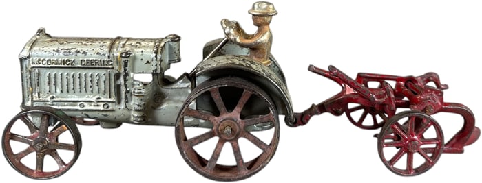 ARCADE MCCORMICK DEERING TRACTOR W/ PLOW