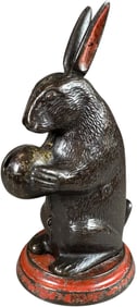 RABBIT W/ BALL MECHANICAL BANK