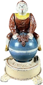 CLOWN ON GLOBE MECHANICAL BANK