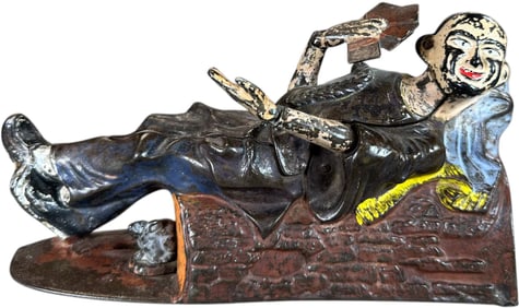 RECLINING CHINAMAN MECHANICAL BANK