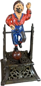 BOY ON TRAPEZE MECHANICAL BANK