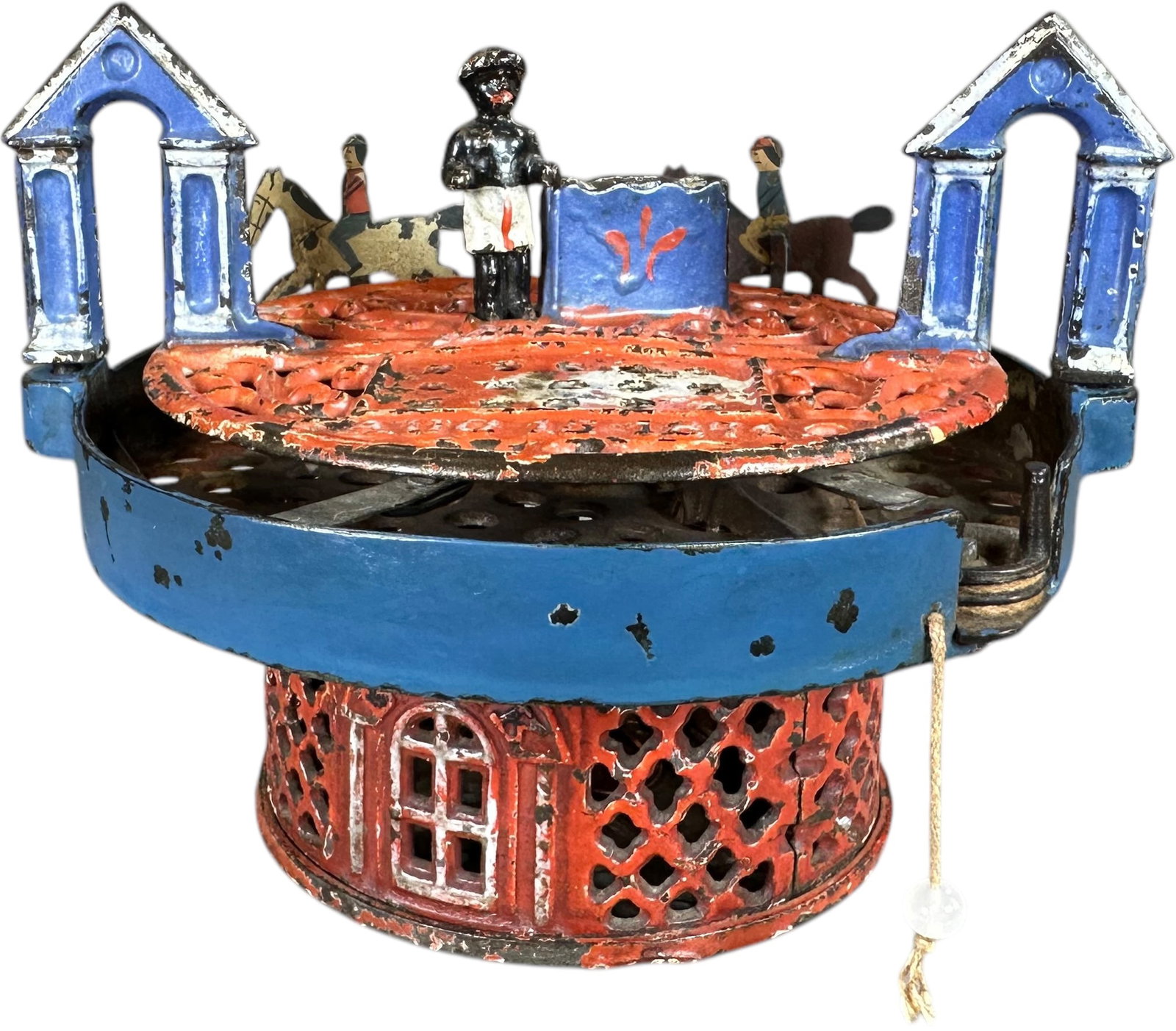 HORSE RACE MECHANICAL BANK: 470. HORSE RACE MECHANICAL BANK | J&E Stevens Co. | 6" l. | Original bottom and top halves, blue along top rim and red at underside of middle section is repainted, horses replaced, (Very Good to Excel