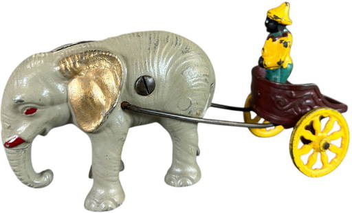 ELEPHANT BANK PULLING CIRCUS CART: 526. ELEPHANT BANK PULLING CIRCUS CART | 8.5" l. | Restored, toy is assembled using a Hubley elephant and a Harris back end, (Excellent Condition) | $200 - $400