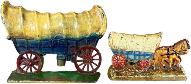 TWO CONESTOGA WAGON DOORSTOPS