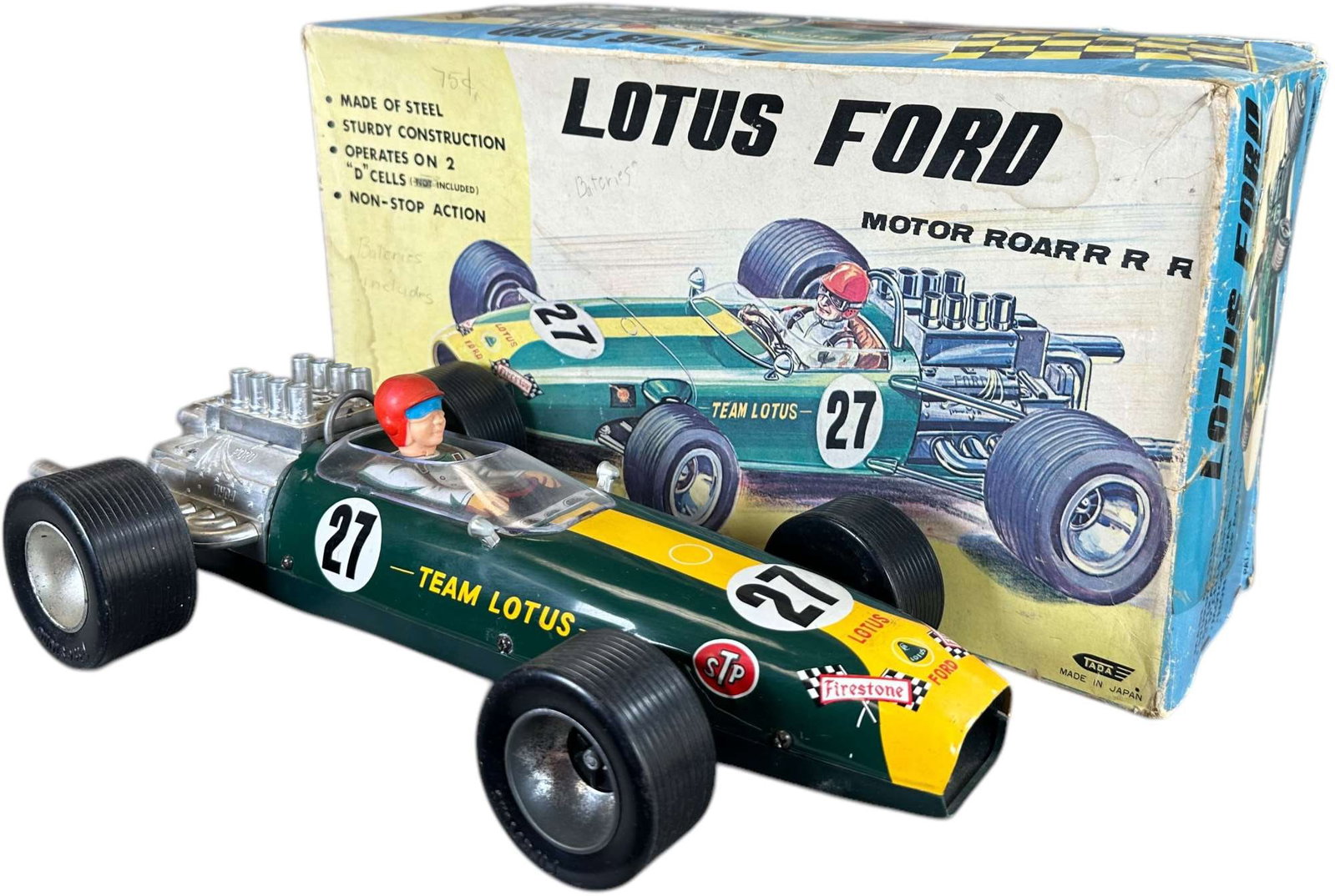 BOXED TADA LOTUS 49 FORD F-1 RACER: 6. BOXED TADA LOTUS 49 FORD F-1 RACER | Japan, battery-op motor not working at the time of testing. | 14.5" l. | Tear and taped area of box, toy in (Excellent Condition) | $200 - $400