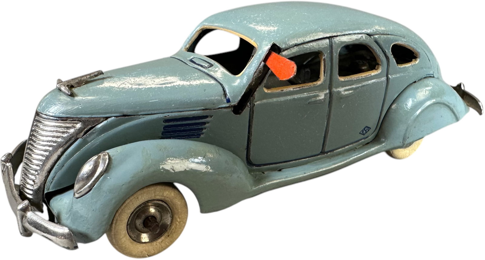 TT ASAKUSA KOSUGE SEDAN W/ TAXI SIGNAL: 19. TT ASAKUSA KOSUGE SEDAN W/ TAXI SIGNAL | Japan, working wind-up motor, scarce example. Ex: Ira Bernstein Collection. | 5.5" l. | Minor touch-ups to edges along fenders, (Excellent Condition) | $30