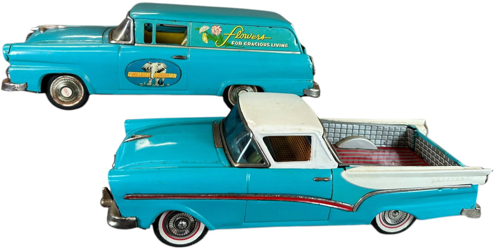 BANDAI FORD DELIVERY WAGON & PICK-UP TRUCK: 168. BANDAI FORD DELIVERY WAGON & PICK-UP TRUCK | Japan, working wind-up motor. | 11.5" l. | Flower wagon has two stripes of overpaint to creases of hood, missing hinge arm at trunk, otherwise both in