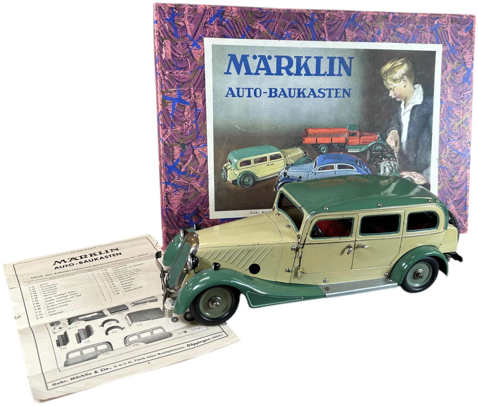 BOXED MARKLIN 1930S BUILDER SEDAN: 207. BOXED MARKLIN 1930S BUILDER SEDAN | Germany. Wind-up motor is working. Ex: Ira Bernstein Collection. | 15" l. | Tiny spot of touch-up at driver side door hinge, otherwise great authentic example