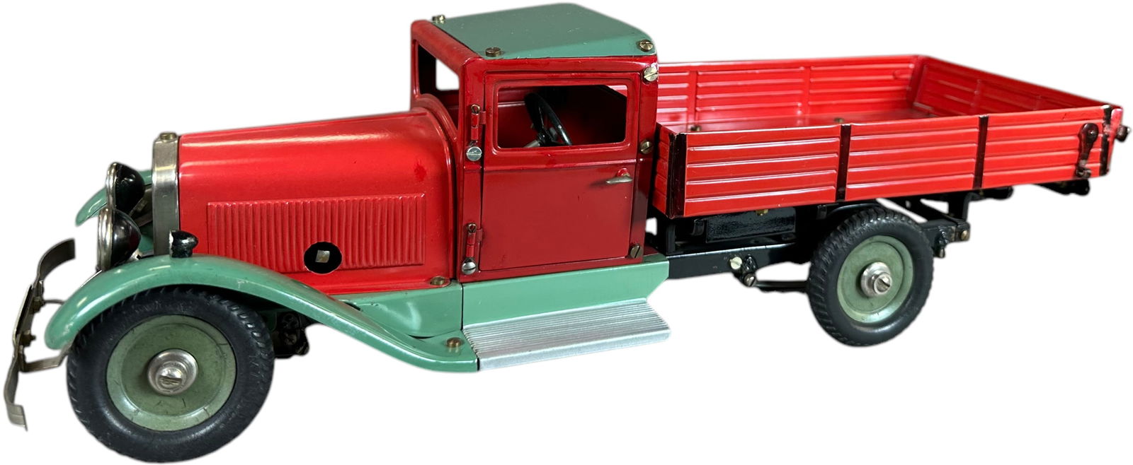 MARKLIN PLATFORM STAKE TRUCK: 208. MARKLIN PLATFORM STAKE TRUCK | Germany. Wind-up motor is working. Ex: Ira Bernstein Collection. | 15.5" l. | Very minimal spots of in-painting to chips, (Excellent Condition) | $200 - $400