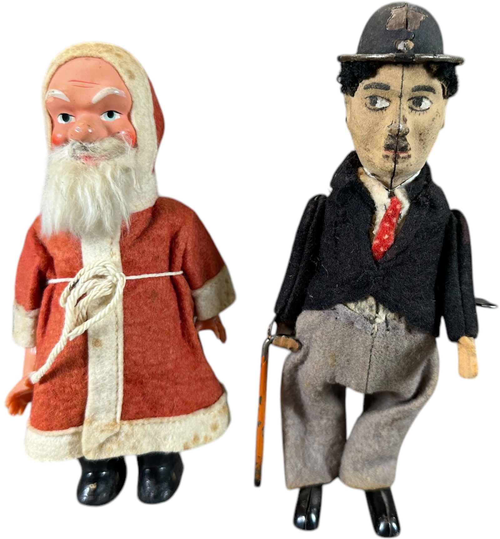 SCHUCO CHARLIE CHAPLIN W/ SANTA WALKERS: 227. SCHUCO CHARLIE CHAPLIN W/ SANTA WALKERS | Germany, working wind-up motor. | 6.5" h. Chaplin | (Very Good Condition) | $200 - $400