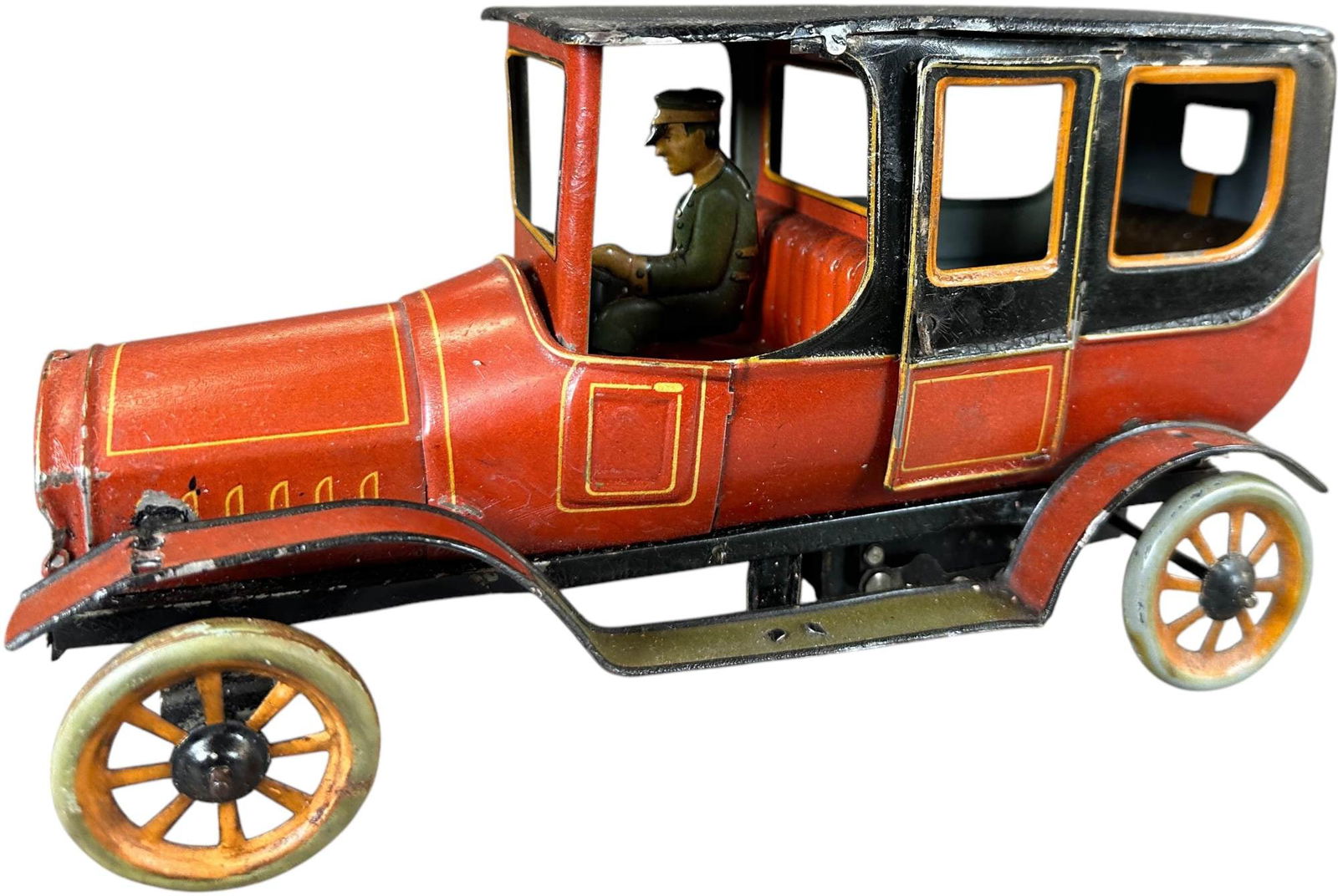 BING LIMOUSINE W/ CHAUFFER: 239. BING LIMOUSINE W/ CHAUFFER | Germany. | 9" l. | Some very minor factory touch-up to rear window, one replaced front wheel and two posts supporting fenders at bonnet, otherwise (Excellent Conditio