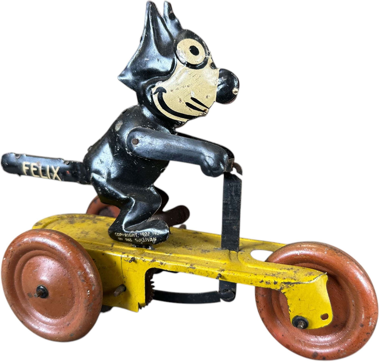 GUNTHERMANN FELIX THE CAT SCOOTER: 262. GUNTHERMANN FELIX THE CAT SCOOTER | Germany, wind-up motor. | 7.5" l. | Replaced arms, otherwise (Very Good Condition) | $300 - $600